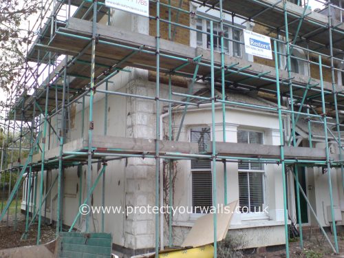 Georgian house with scaffolding before rendering.