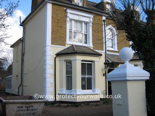 Freshly rendered Georgian house and gate posts.