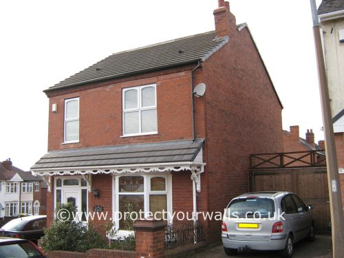 A brick house, side view.