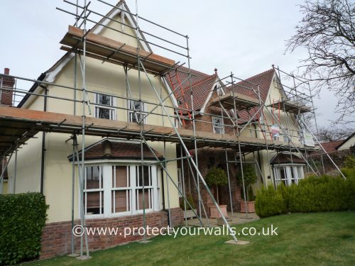 House during rendering, Essex.