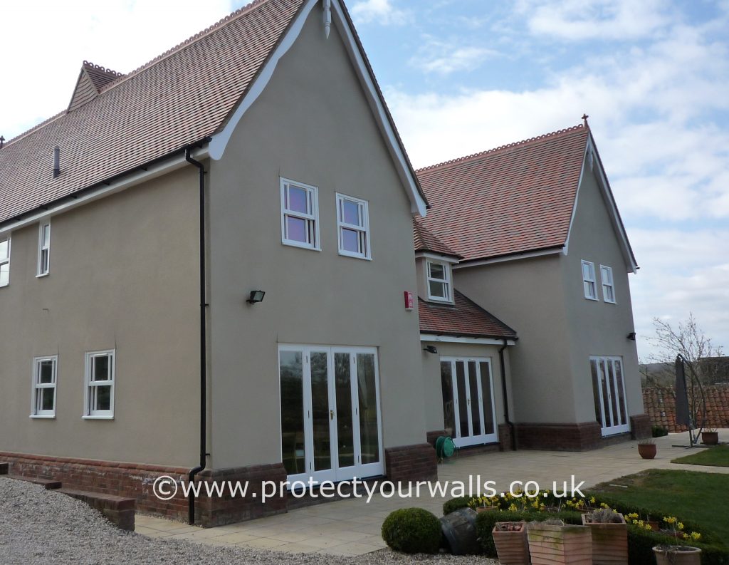 Freshly rendered house, Essex - front view.