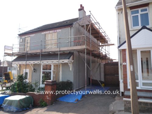 Preparing a house for rendering, front view.