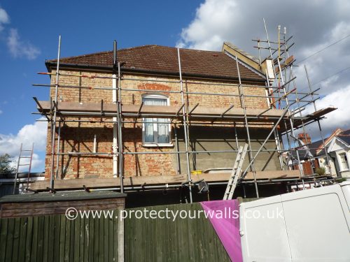 A house stripped down to the bricks prior to rendering.