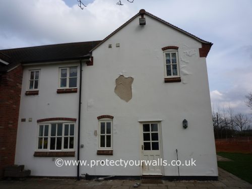 Aged and blistered exterior walls.