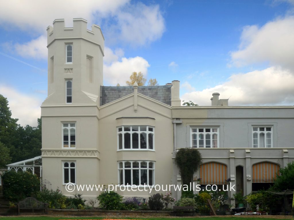 A house with a turret during the rendering process, side view.