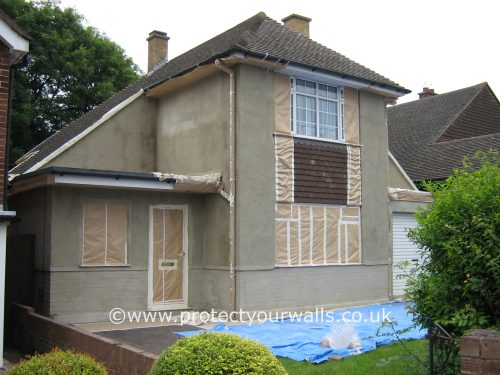 Preparing a house for rendering.